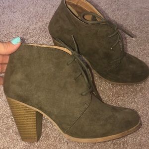Dark green booties with a heel